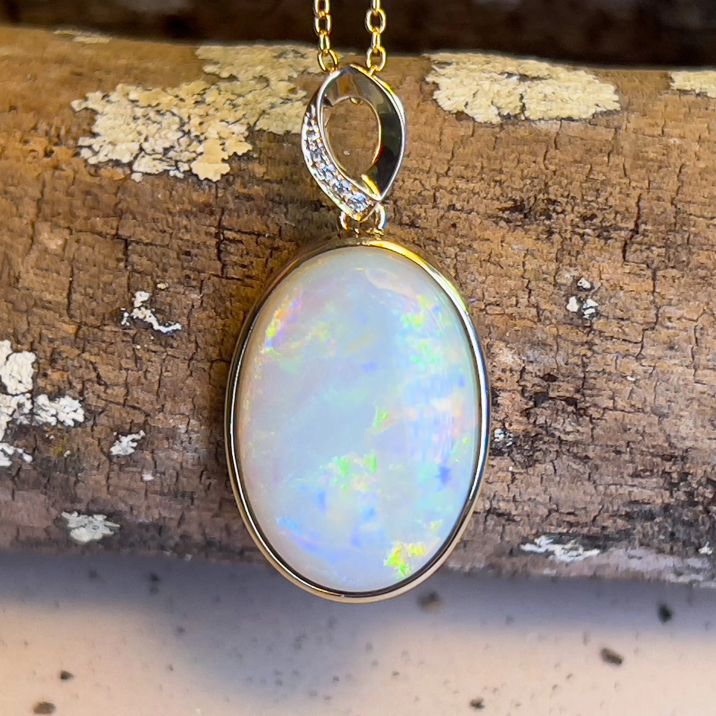 14kt Yellow Gold Large Opal 11.26ct oval shape pendant bezel set