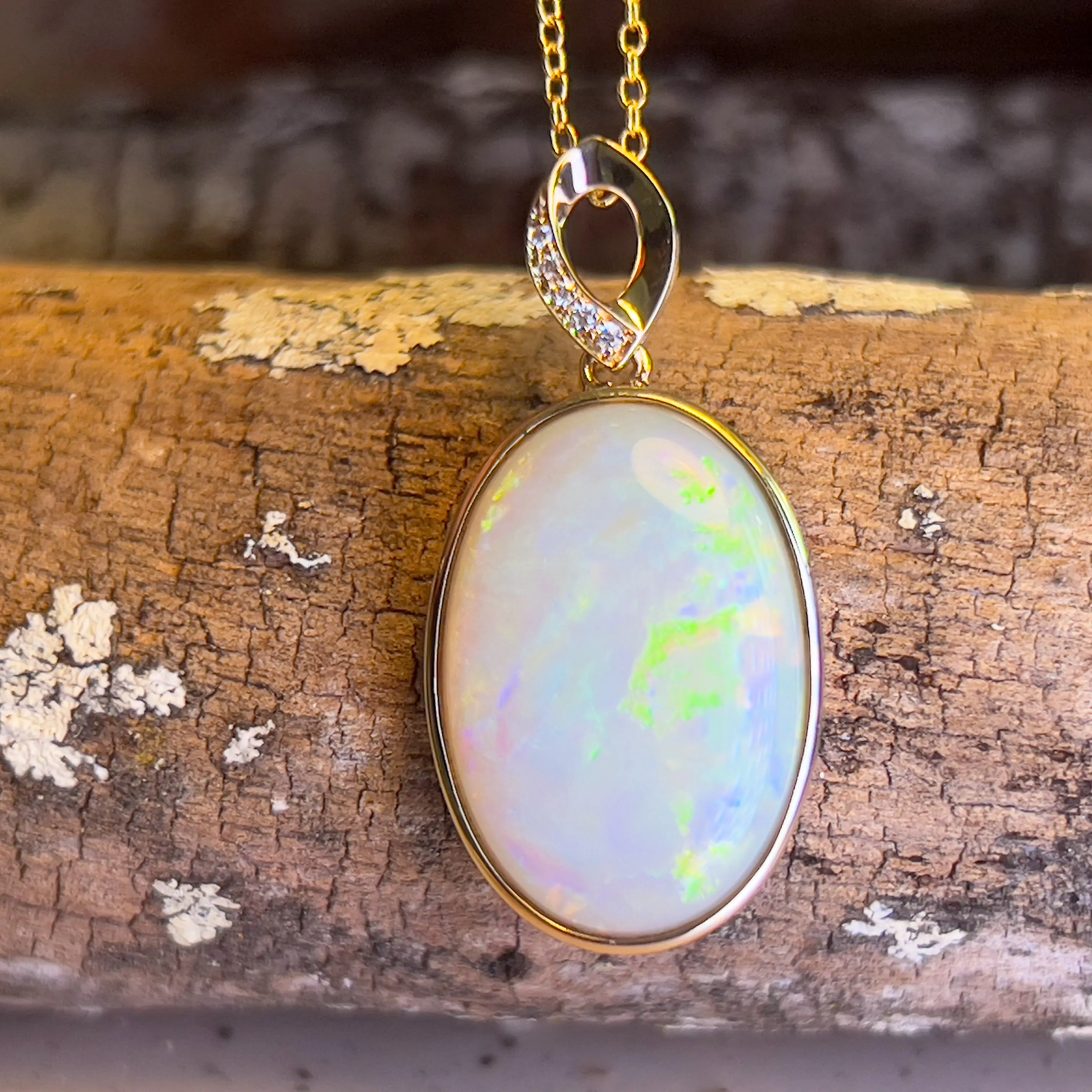 14kt Yellow Gold Large Opal 11.26ct oval shape pendant bezel set