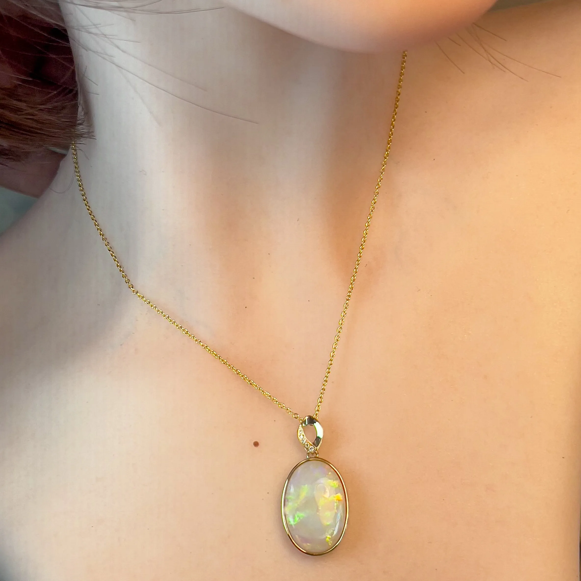 14kt Yellow Gold Large Opal 11.26ct oval shape pendant bezel set