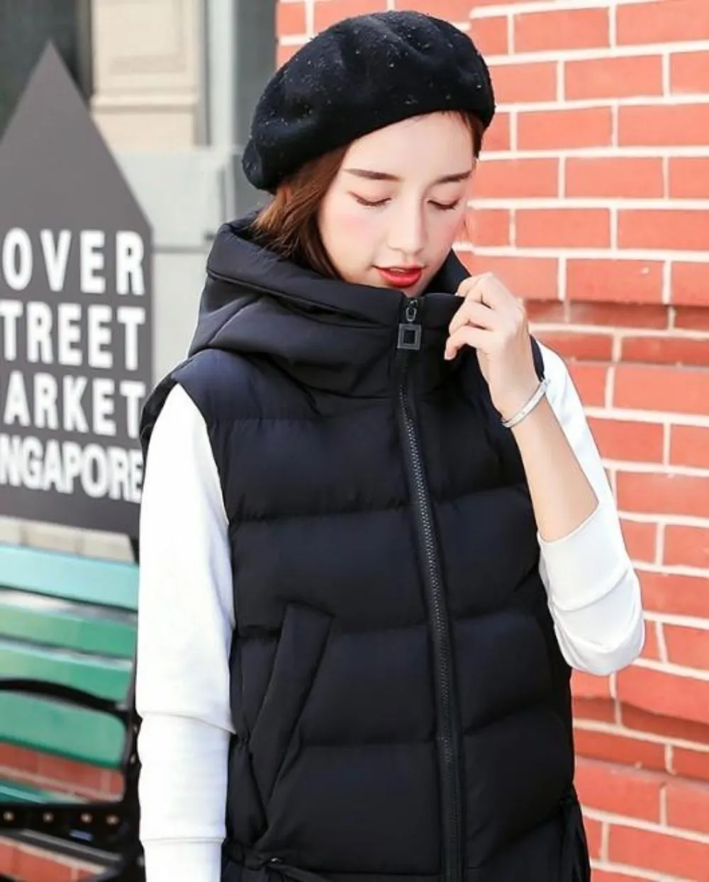 Womens Short Zipped Up Puffer Hooded Vest in Pink